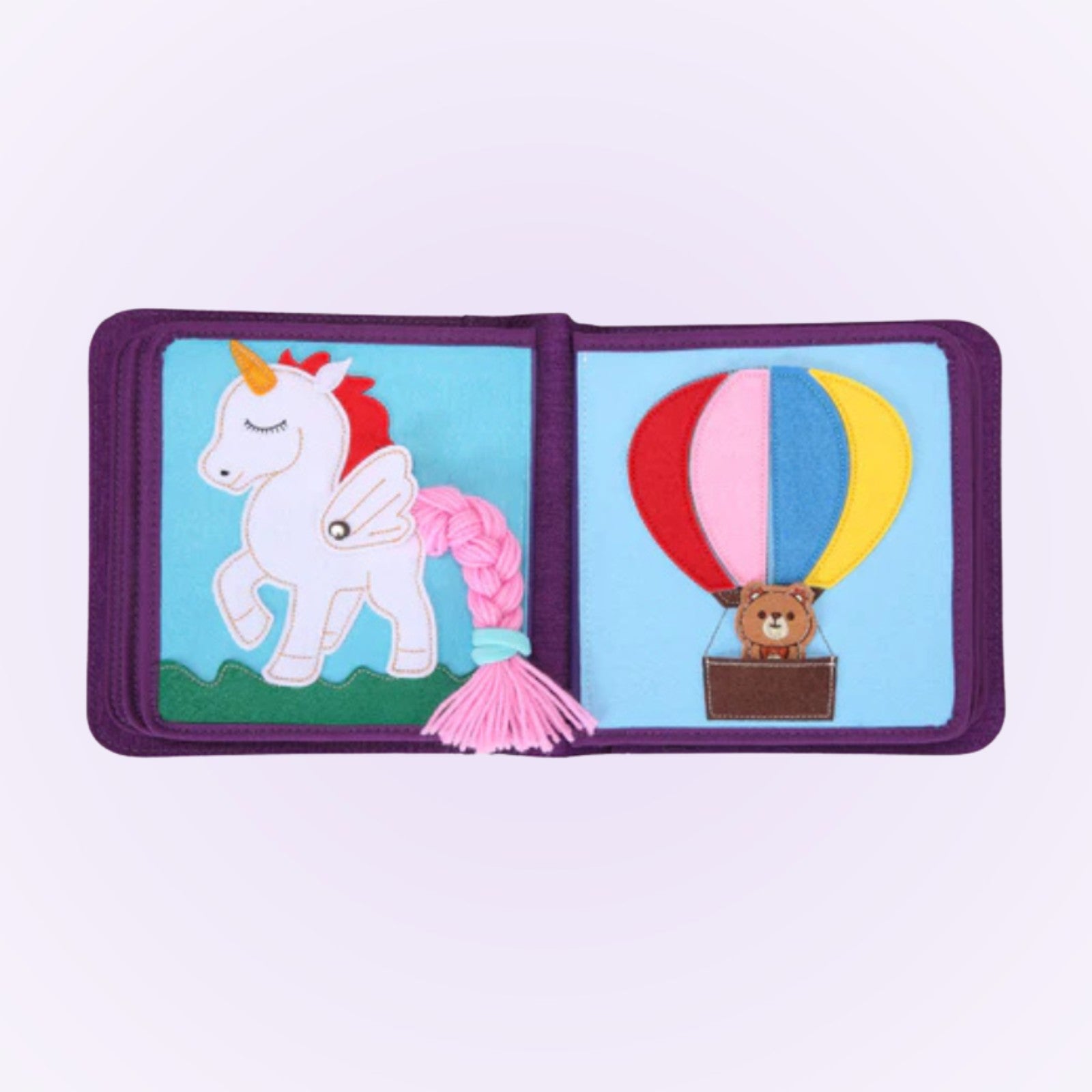 Märchenwelten Doppelseite Einhorn mit Flechtmähne und Heißluftballon auf sanftem Lavendel-Hintergrund – ab 1 Jahr