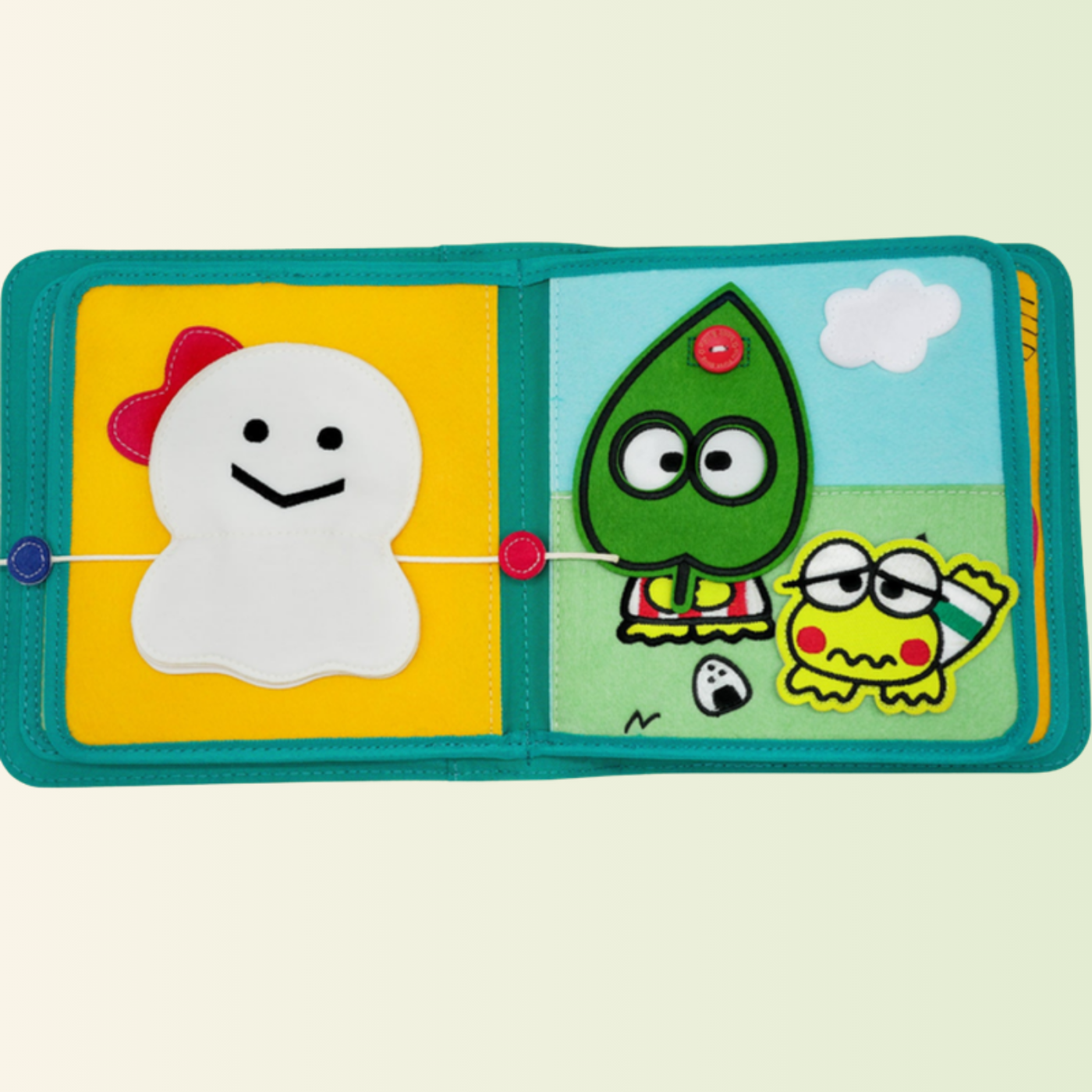 Keroppi Quiet Book – Schnüren und Wetter, freigestellt auf sanftem Wiesen-Hintergrund