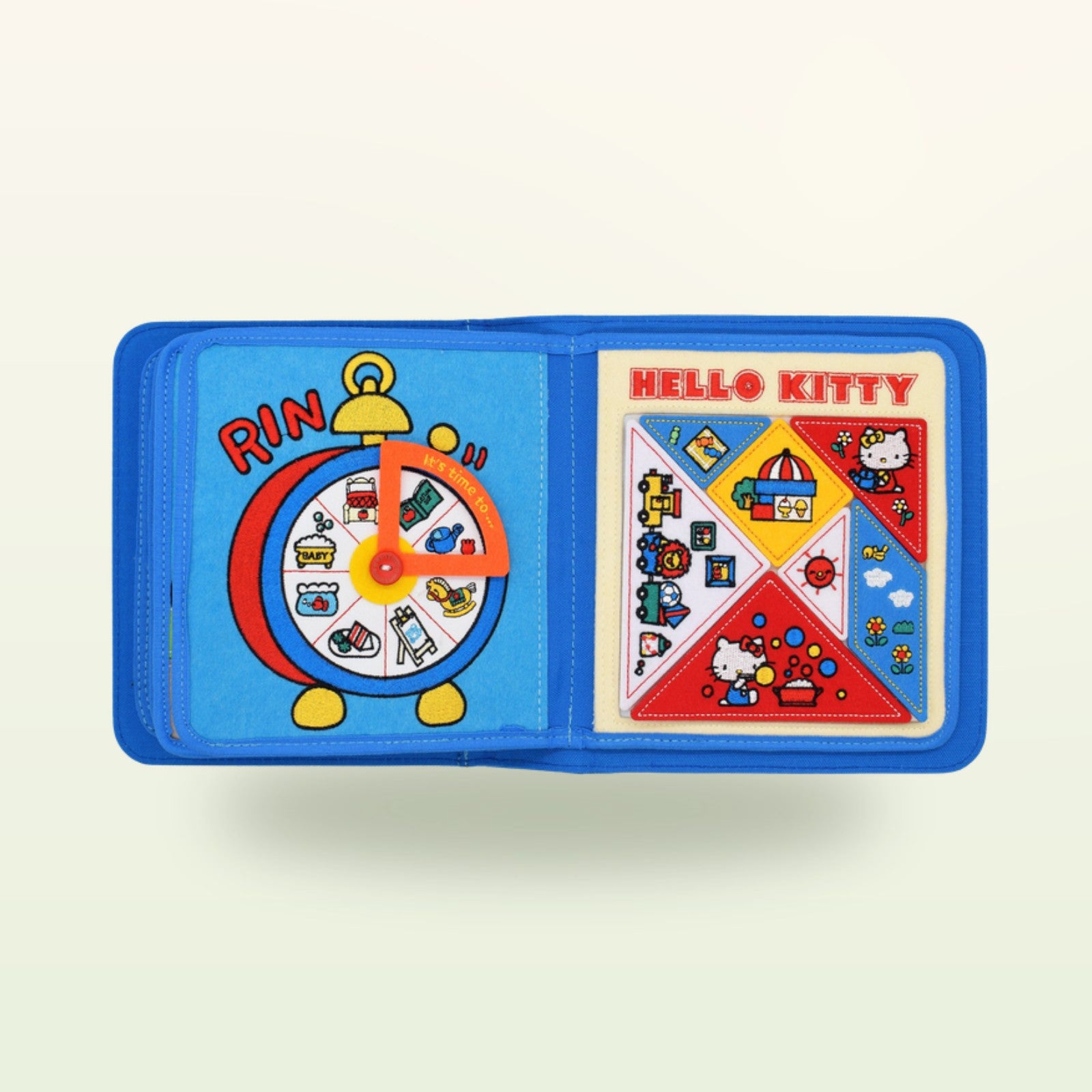 Hello Kitty Quiet Book Filz-Uhr und Puzzle Doppelseite auf sanftem Creme-Hintergrund – ab 1 Jahr