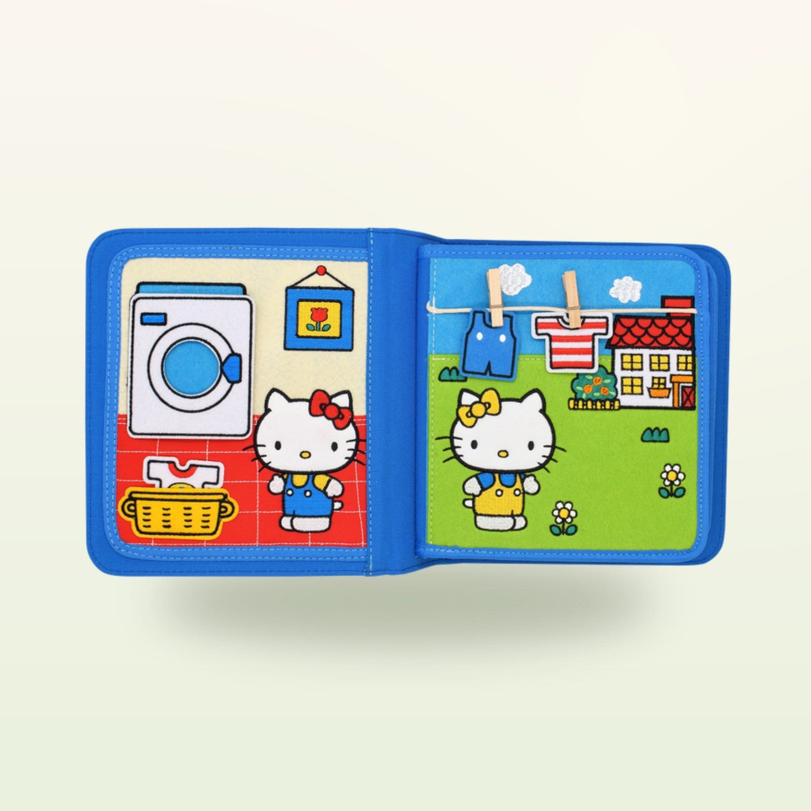 Hello Kitty Quiet Book Wasch-Doppelseite auf sanftem Creme-Hintergrund – ab 1 Jahr