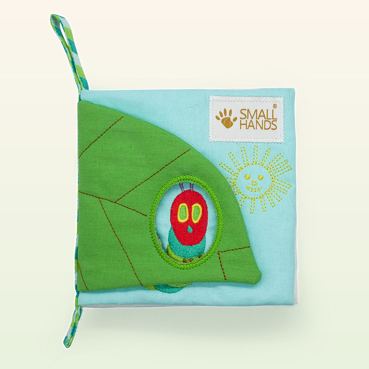 Small Hands Die Raupe Nimmersatt Montessori Stoffbuch – Einband mit Blattklappe, gestickter Sonne und Raupe im Guckloch – ab 0 Monaten